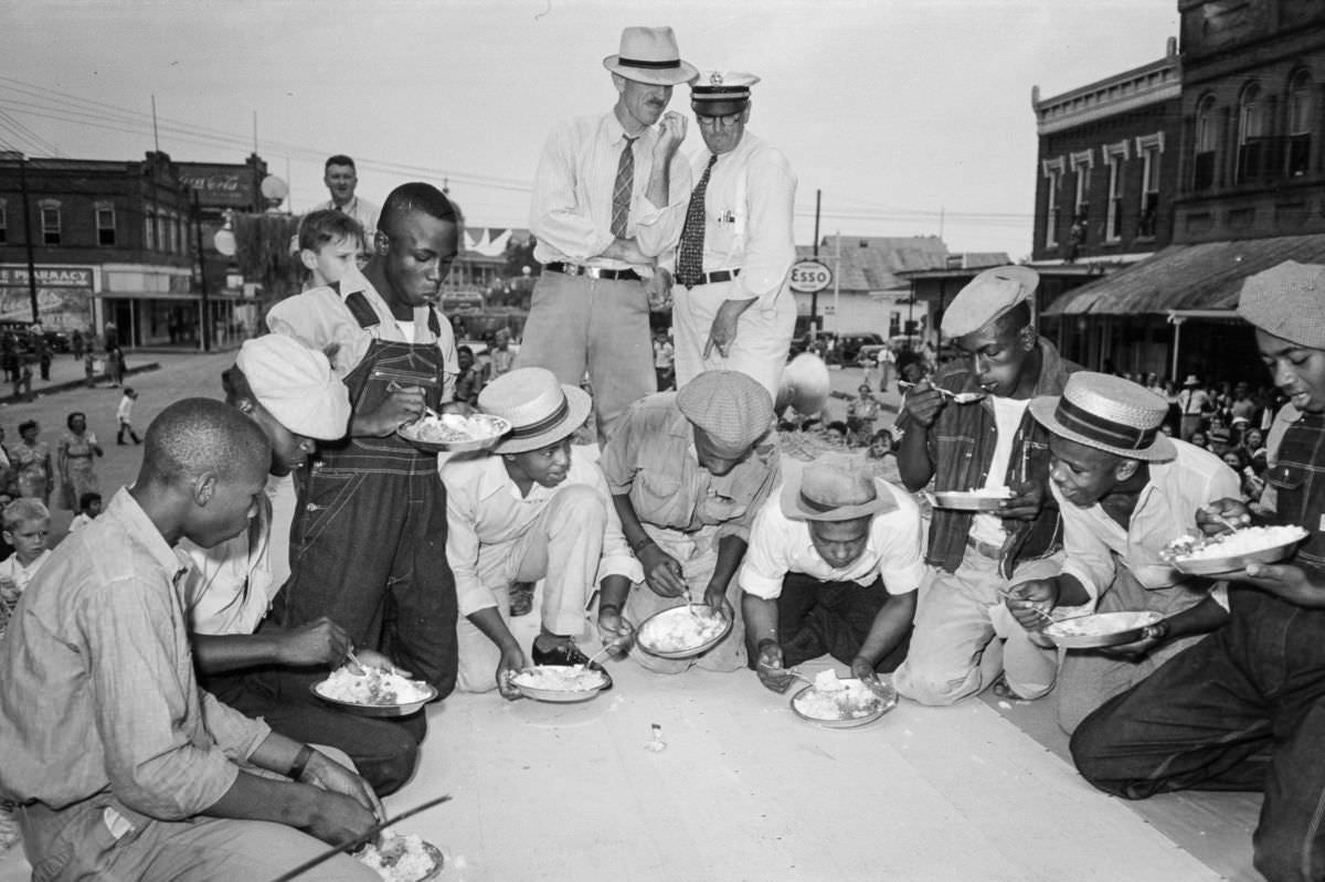 A rice eating contest at the National Rice Festival, Crowley, Louisiana, 1938.