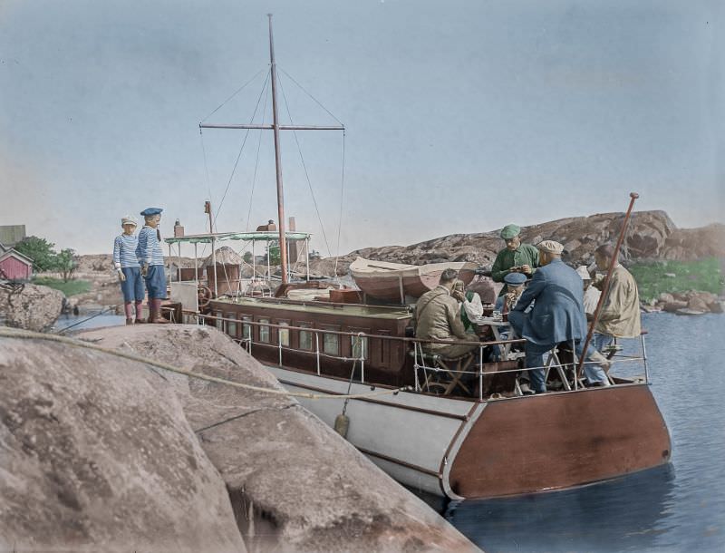 Morning coffee on the afterdeck, somewhere in the Finnish archipelago in 1920