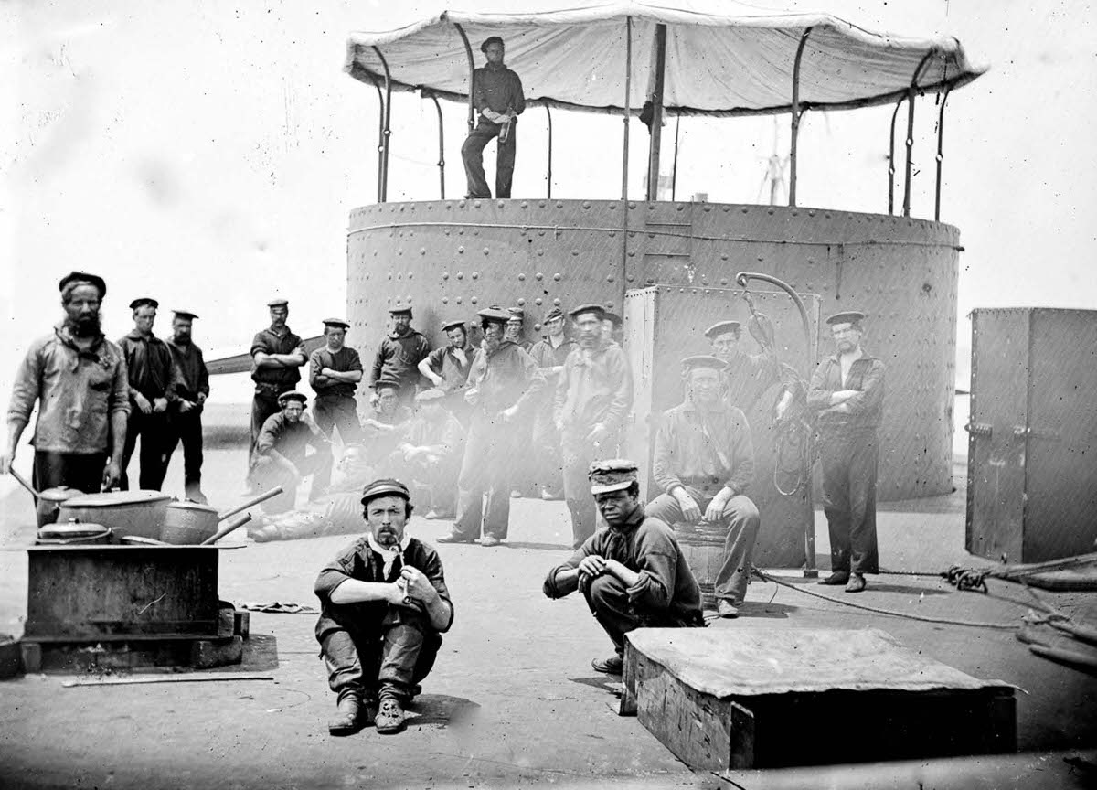 Sailors on the deck of a Monitor-class gunboat, 1864.