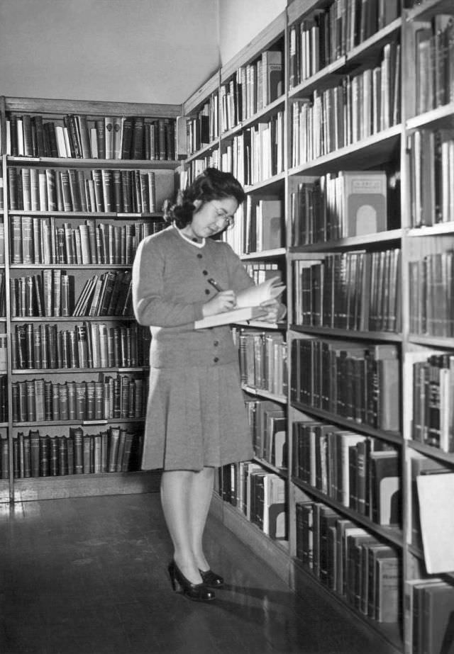 Miss Irene Eiko Yonemura works in the Peoria, Illinois, public library, where she has found work much to her liking and her training.