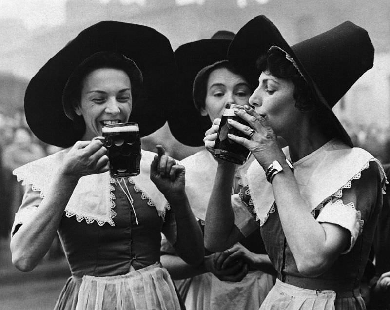 Barmaids in costume from the Festival Inn in East London.