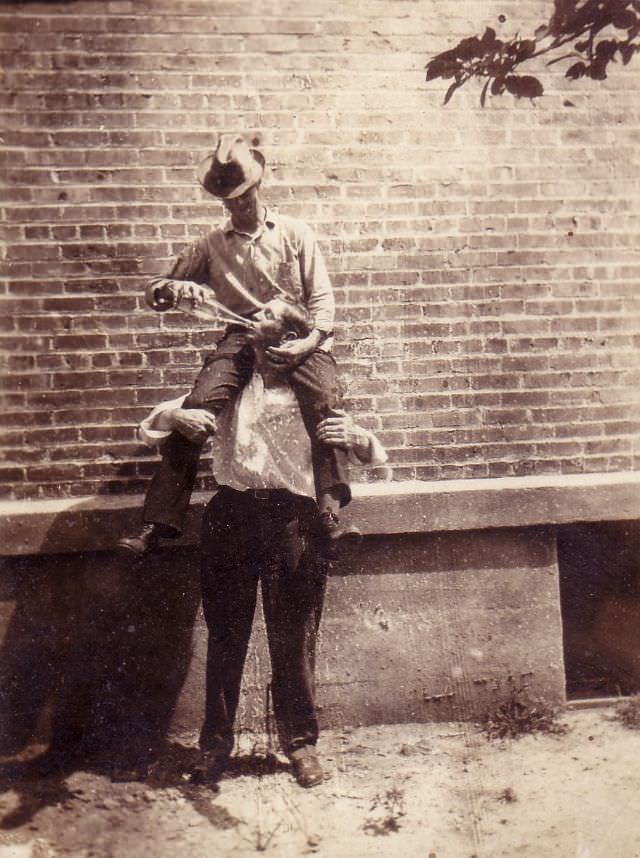 Two men sharing a drink.