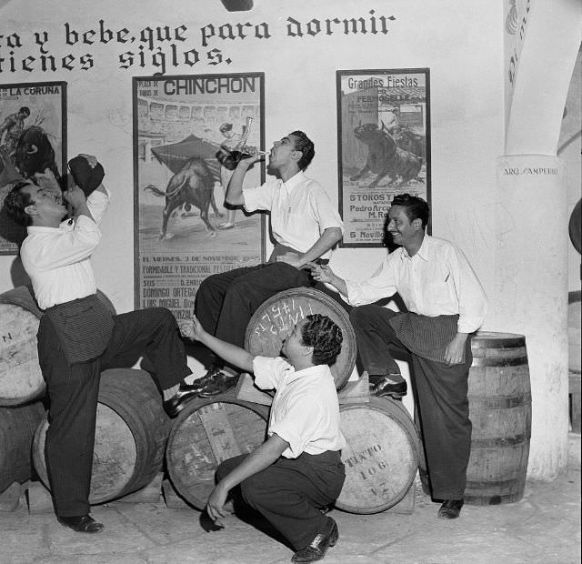 Men drinking wine in a bar in Mexico City.