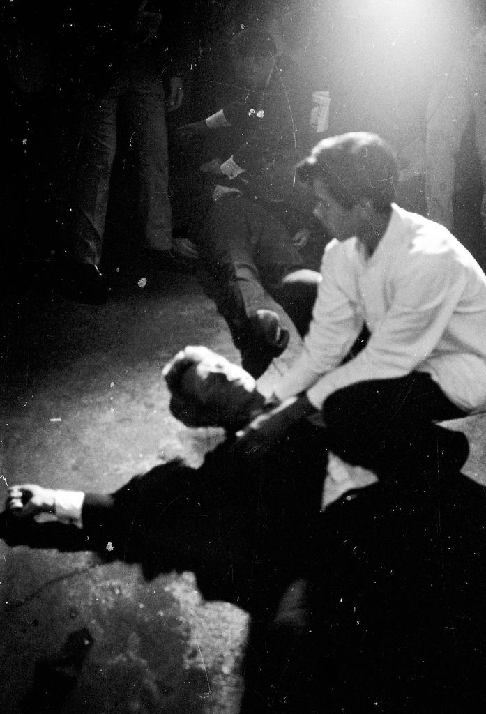 Busboy Juan Romero aiding Senator Robert F. Kennedy.