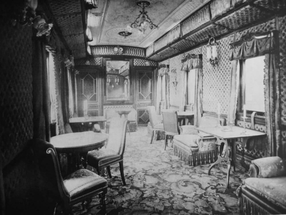 The saloon had soft mahogany furniture in the Art Nouveau style. The walls, sofas, armchairs and chairs were lined in striped pistachio curtains; a plush carpet on the floor had a checked design.