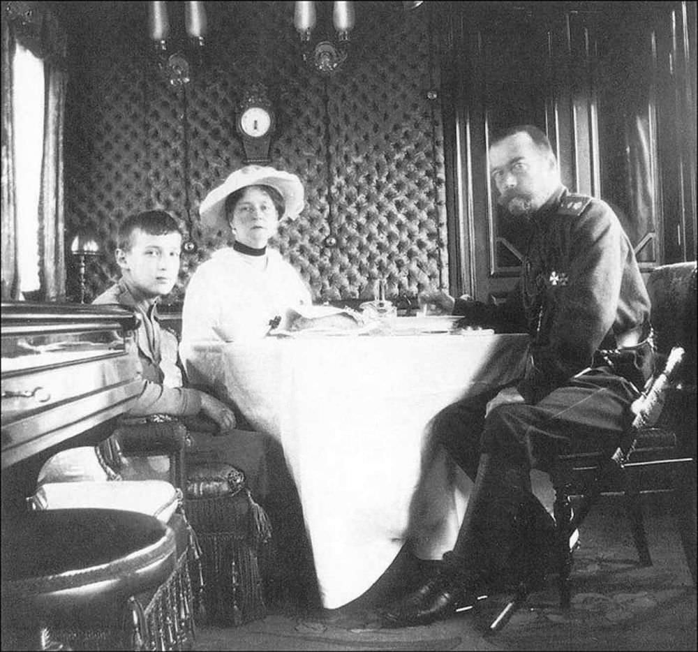 Empress Alexandra, Tsar Nicholas II and Tsarevich Alexei on the train.