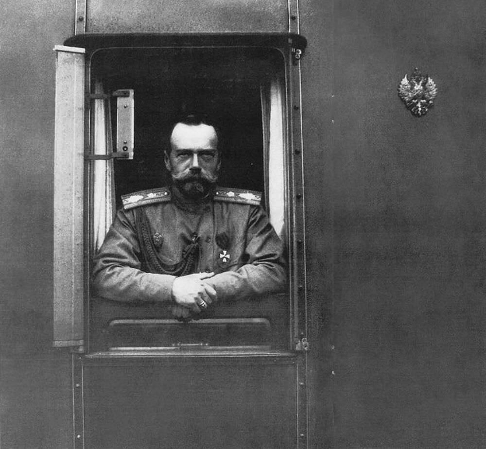 Tsar Nicholas II looking out of the window of the Imperial train.