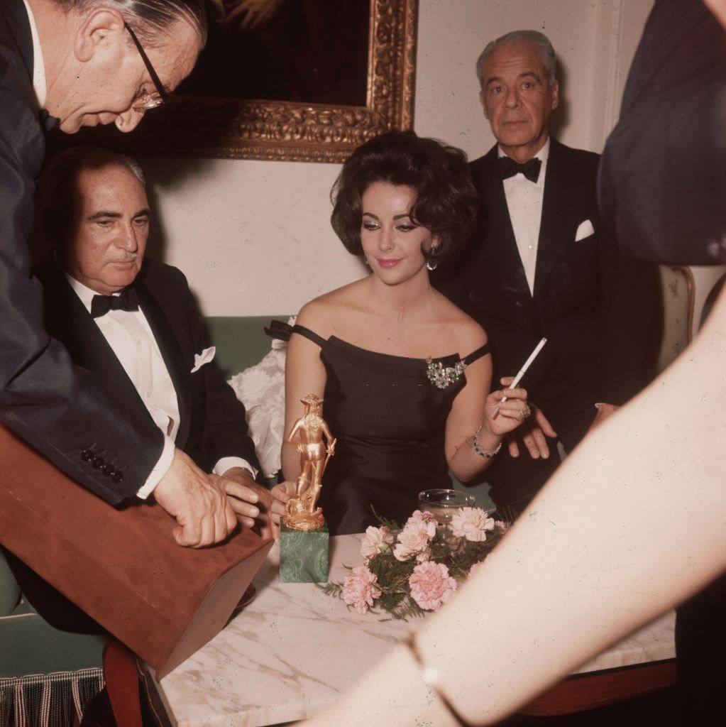 Elizabeth Taylor with an award for her role in the film 'Suddenly Last Summer'.