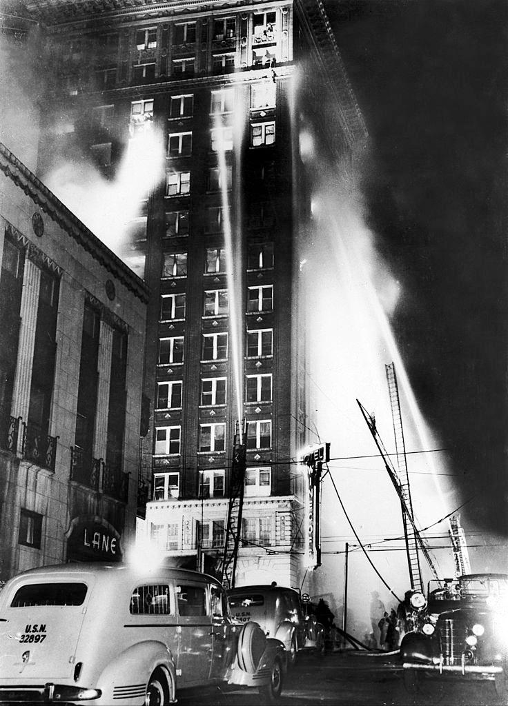 Winecoff Hotel burned and Firefighters struggling against the flames in Atlanta September 12, 1946.