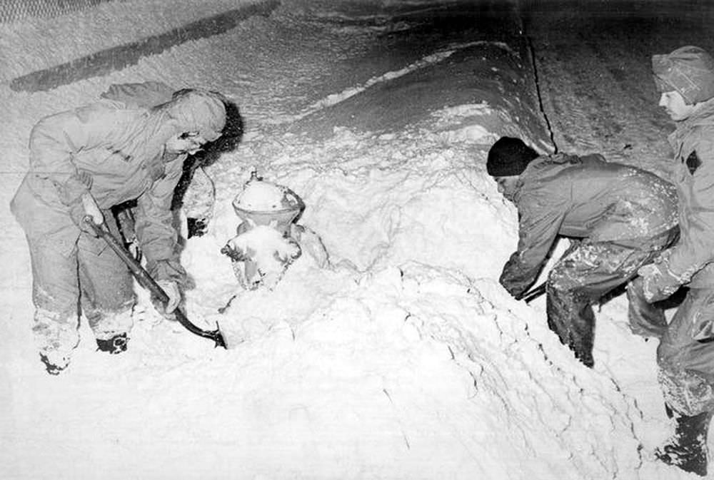 Springfield firefighters dig out a hydrant on Feb. 7, 1978.