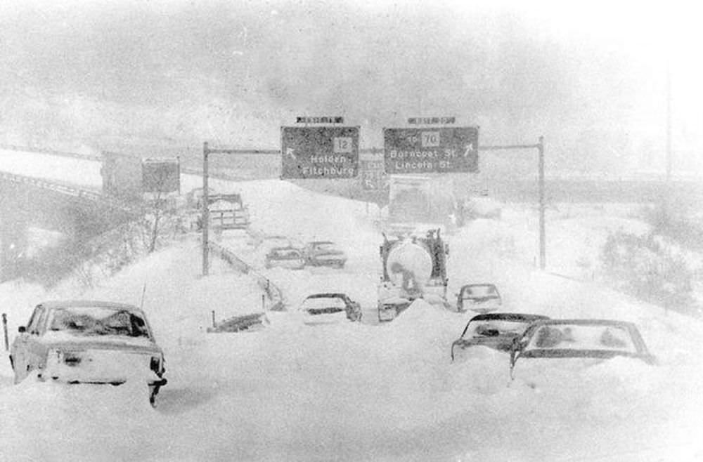 Vehicles are seen stranded and abandoned in the deep snow on the exit for Burncoat Street off Interstate 290 in Worcester, Mass., Feb. 7, 1978.