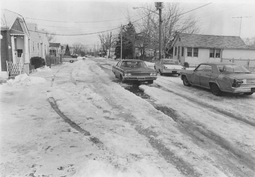 Autos have made ruts in the ice on this section of Olympia Boulevard.