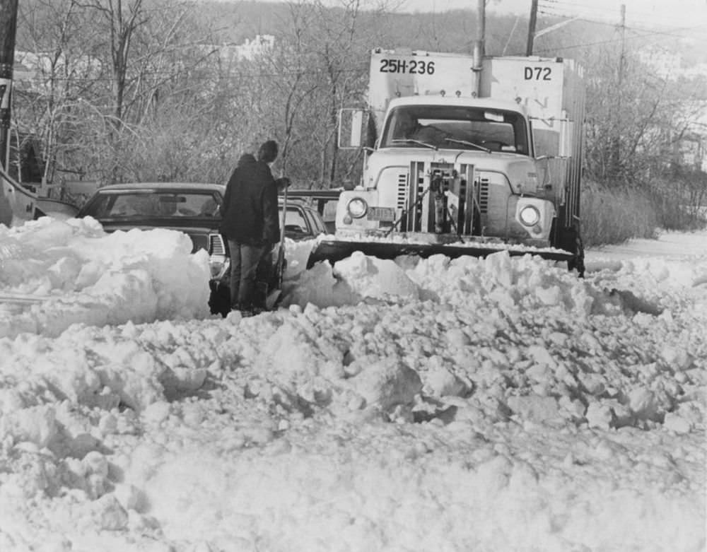 A Sanitation snow plow is welcome relief to residents on Naughton Ave., Ocean Breeze.