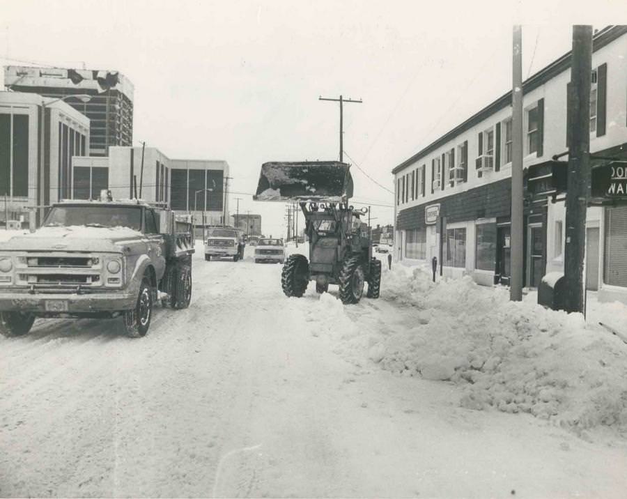 This front-loader is working on Front St. just north of Main St., Jan. 29, 1978.
