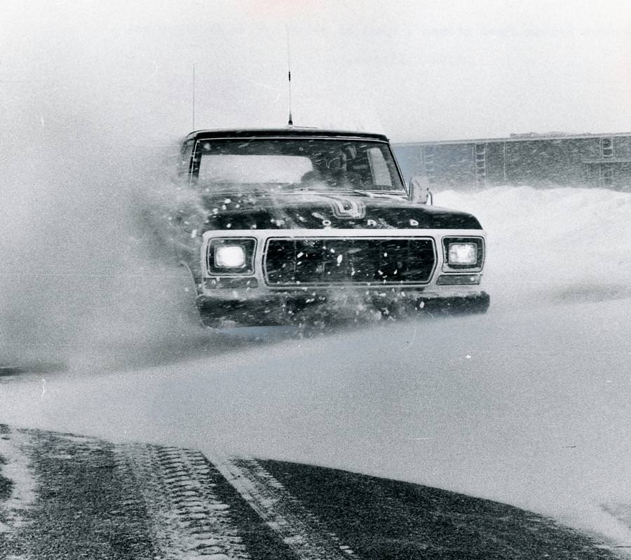 Pete Geiger tests out the four-wheel drive on a Ford Bronco on snow drifts in Wayne County in the Jan. 27, 1978.