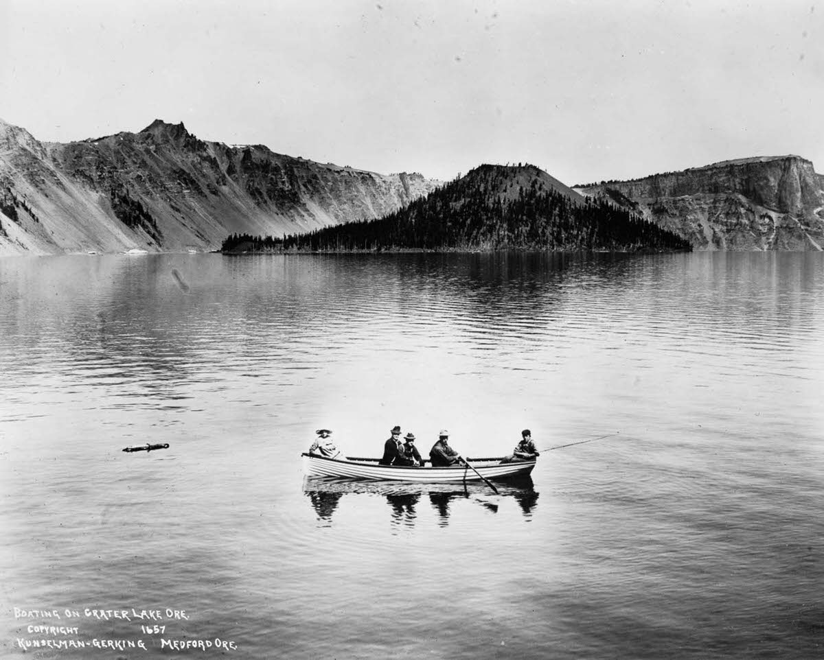 Tourists boat across Crater Lake, 1912.