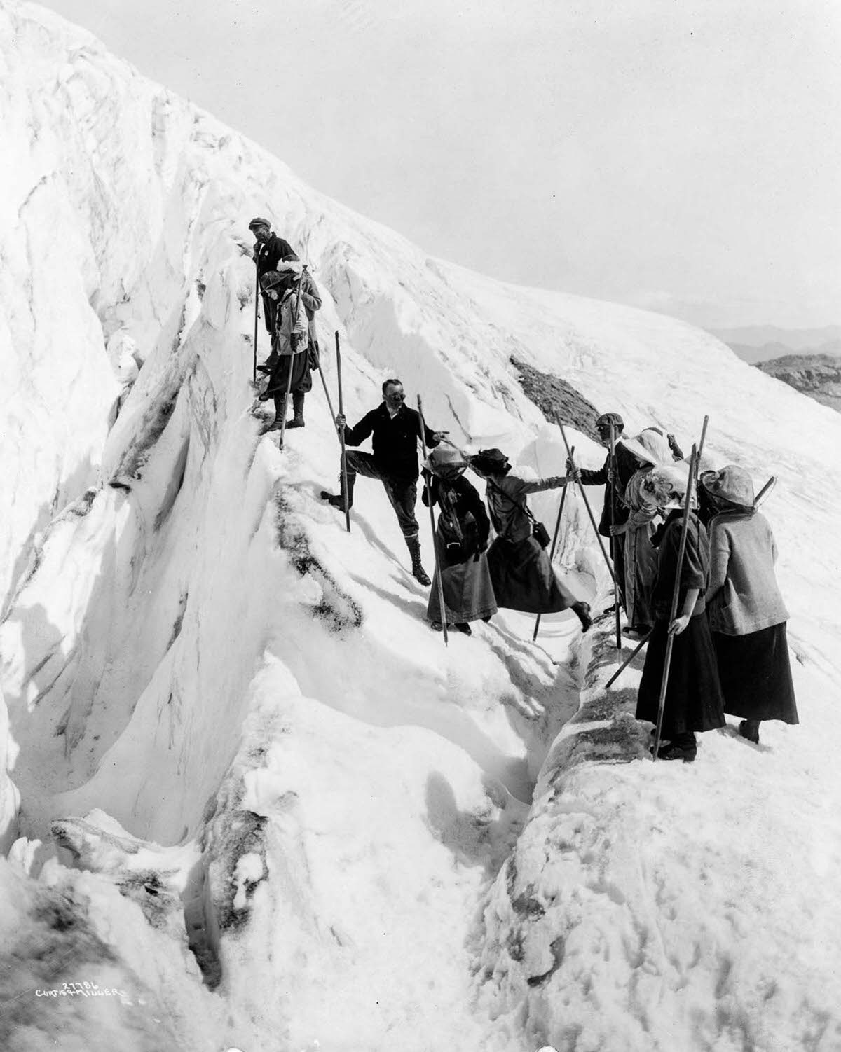 Tourists climb Paradise Glacier in Mt. Rainier National Park, 1911.