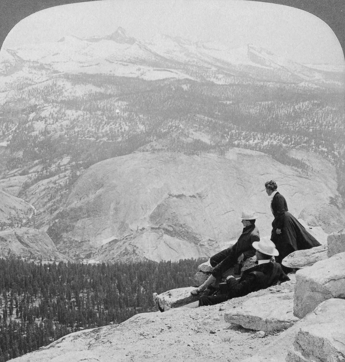 Tourists look from Clouds Rest over the Little Yosemite Valley to Mount Clark, 1902.
