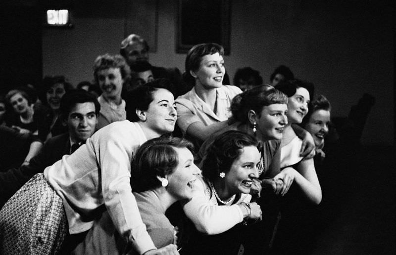 A group of teenagers at a ceremony, 1955.