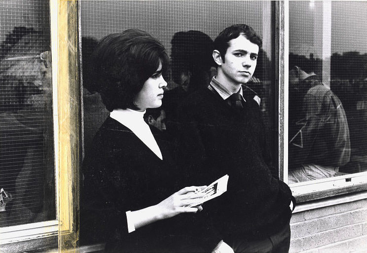 Couple in front of window, Richmond Jazz Festival, July 1962