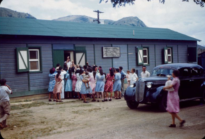 Hospital door, crowd gathered around entrance to La Plata hospital, La Plata