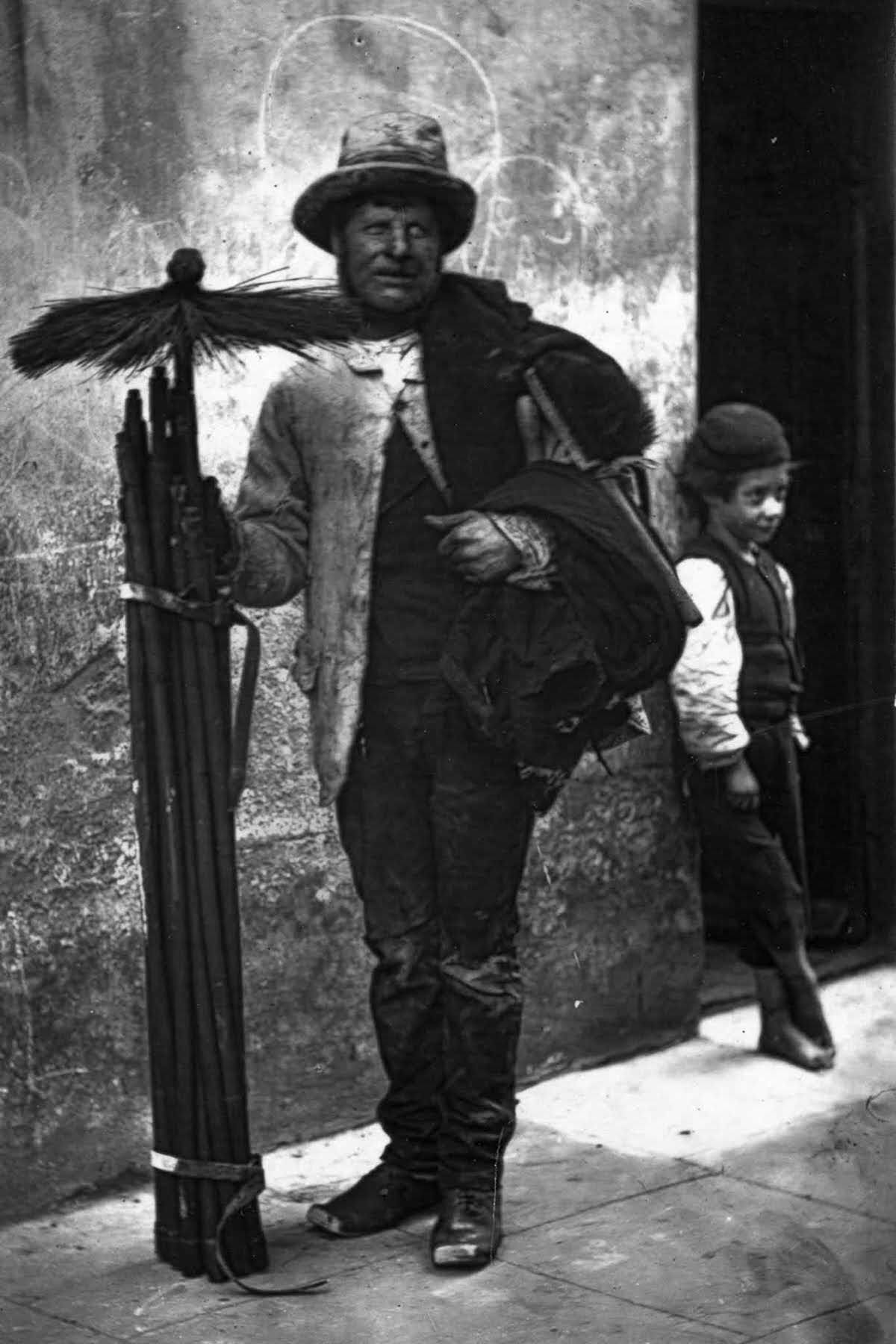 A chimney sweep and his assistant, 1877.