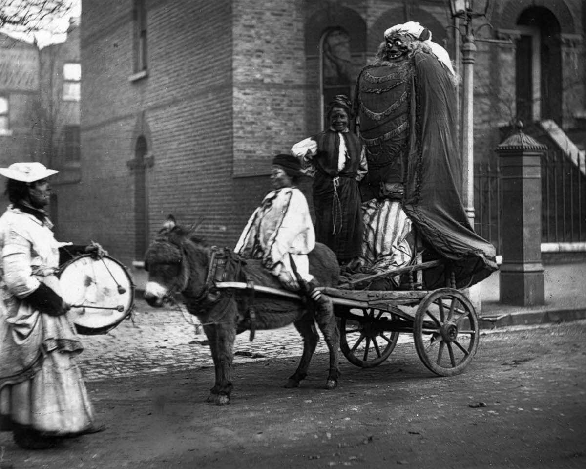 A street procession on Bonfire Night, also known as Guy Fawkes Night, 1876.