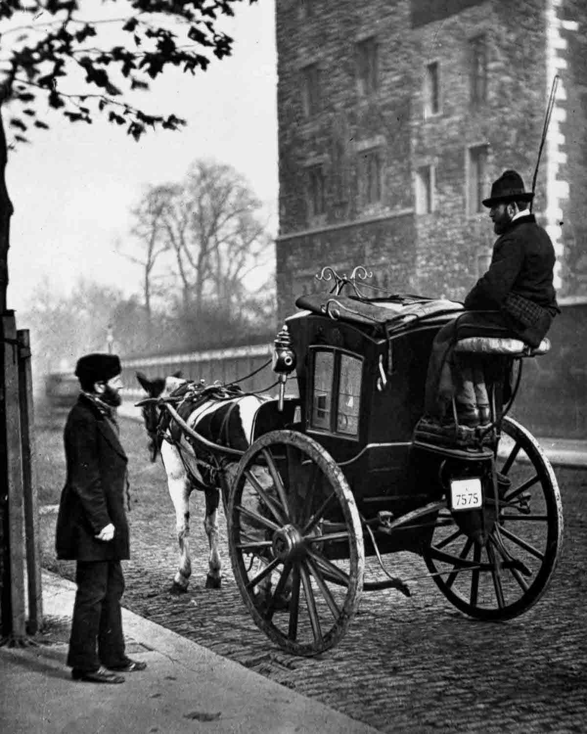 A horse-drawn hansom cab, 1877.