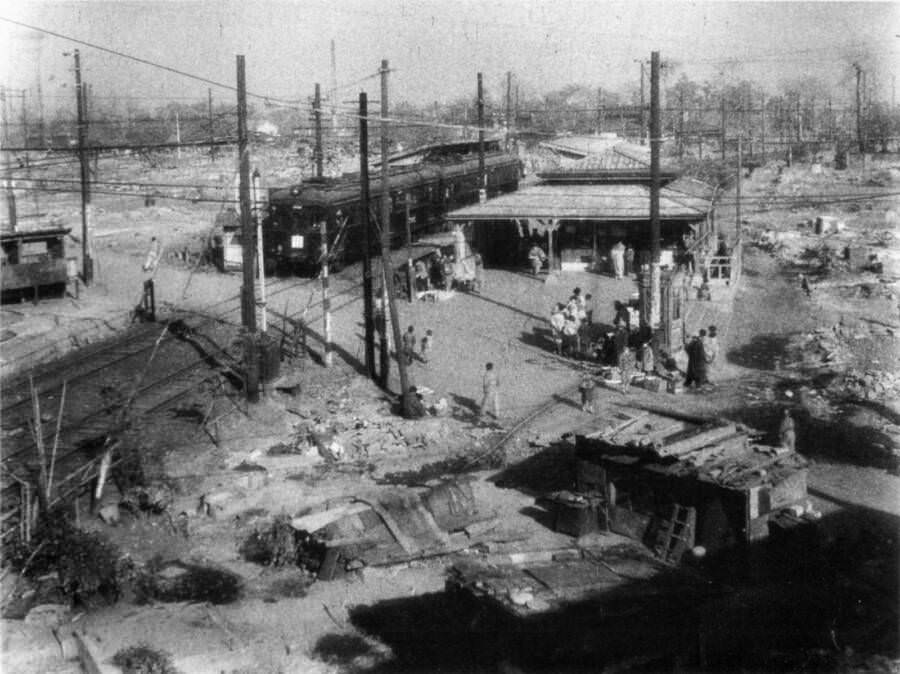 An unexpectedly functioning train pulls into Togoshi-Koen Station as part of its route on the Tōkyū Ōimachi Line. 1945. Tokyo, Japan.
