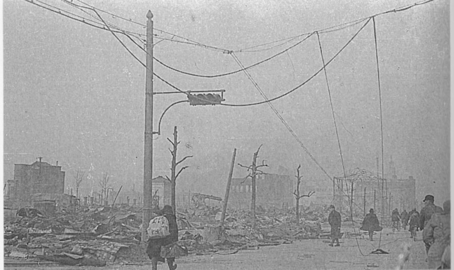 Not a single leaf remained on any of the trees captured in this photograph. The city-wide blaze had burnt too hot for far too long. Miraculously, this particular streetlamp withstood the bombings. March 10, 1945. Tokyo, Japan.