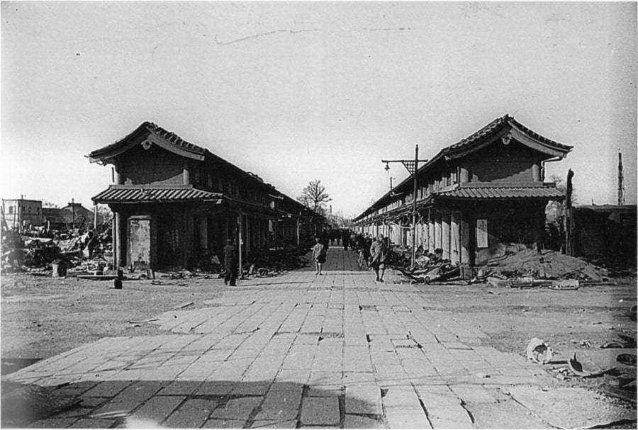 Taken from the ground, this image shows some of the few buildings still standing near the Asakusa Matsuya Department Store. March 19, 1945. Tokyo, Japan.