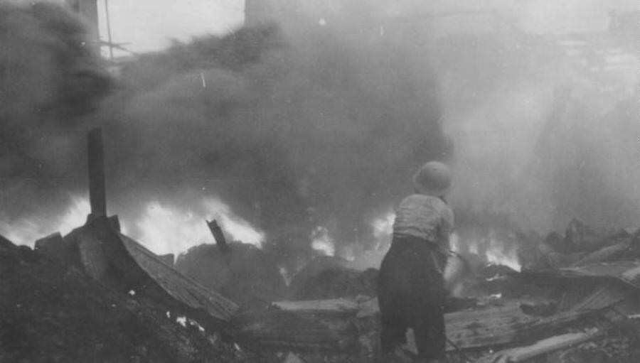 Flames raging in Tokyo the morning after being hit with 1,500 tons of firebombs.