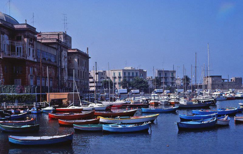 View of the small-craft harbor, Bari. The Fortino di Sant'Antonio abate is visible in the distance (right), and the Teatro Margherita is visible at the left