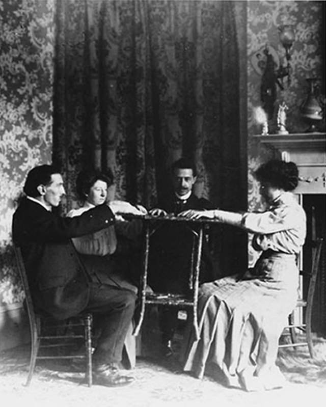 William Marriott demonstrating how small tables could be easily levitated with nothing more than his foot – which was virtually undetectable in a dark room.