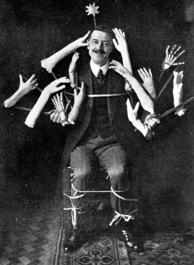 William Marriott with simulated spirit hands.