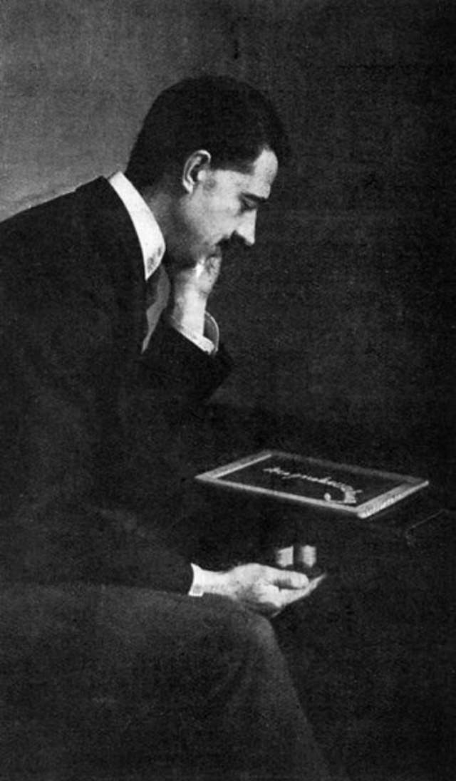 William Marriott demonstrating a slate writing trick.