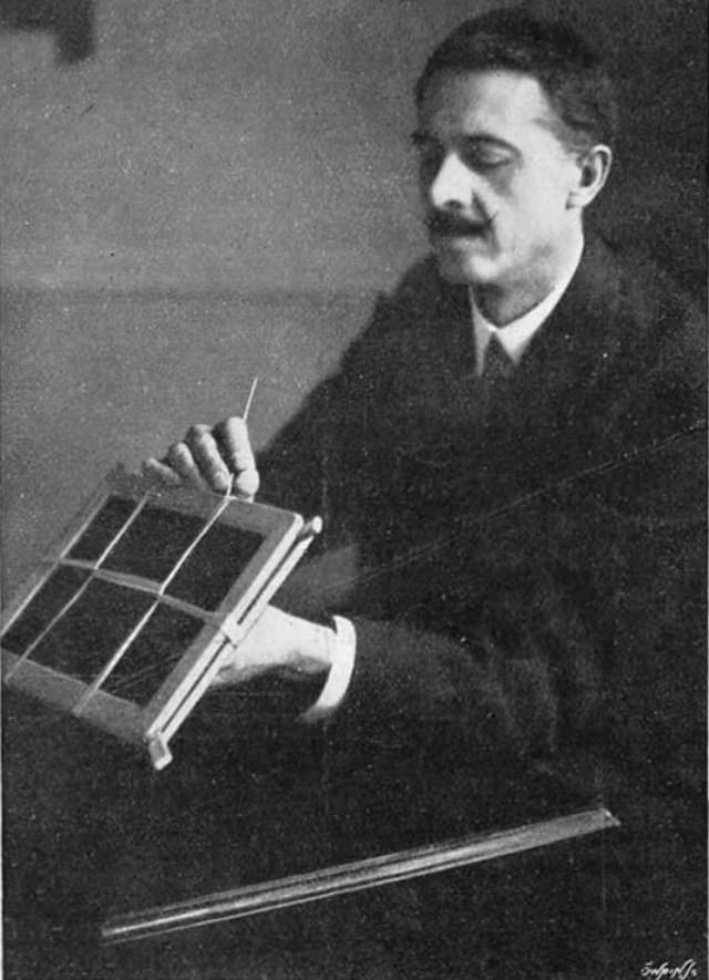 William Marriott demonstrating a slate writing trick.