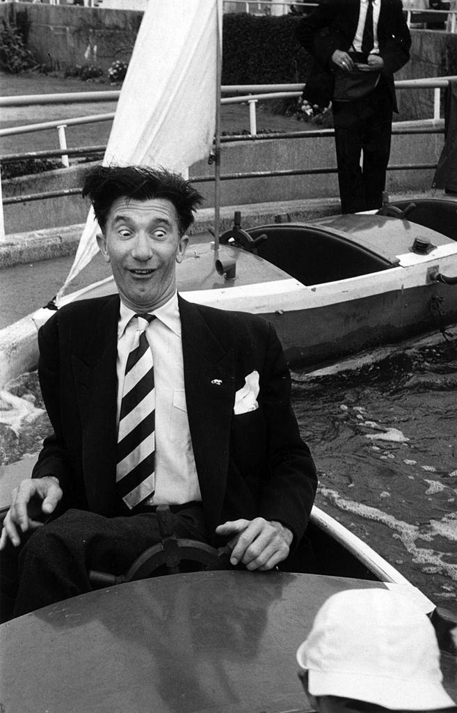 Blackpool comedian Nat Jackley taking his son for a ride on the Pleasure Beach, 1953.