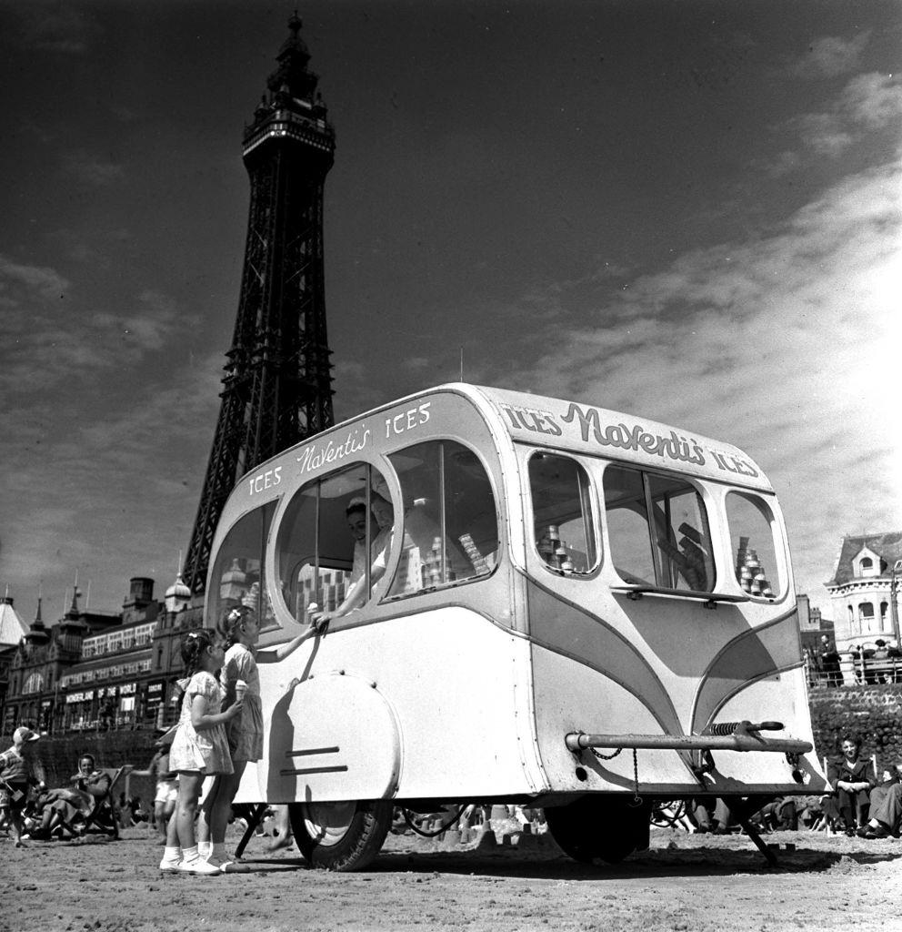 A new ice cream barrow on the beach at Blackpool, 1952.