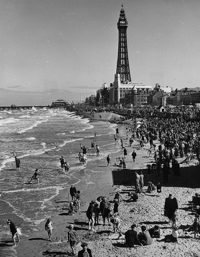 Crowds of day-trippers on the beach at Blackpool, Lancashire, 1955.