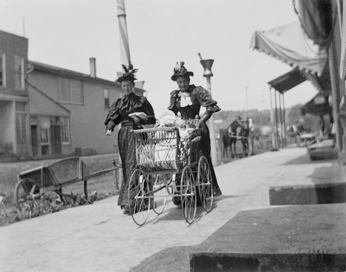 Two women with baby in wicker carriage – George Silas Duntley Photographs 1899-1918