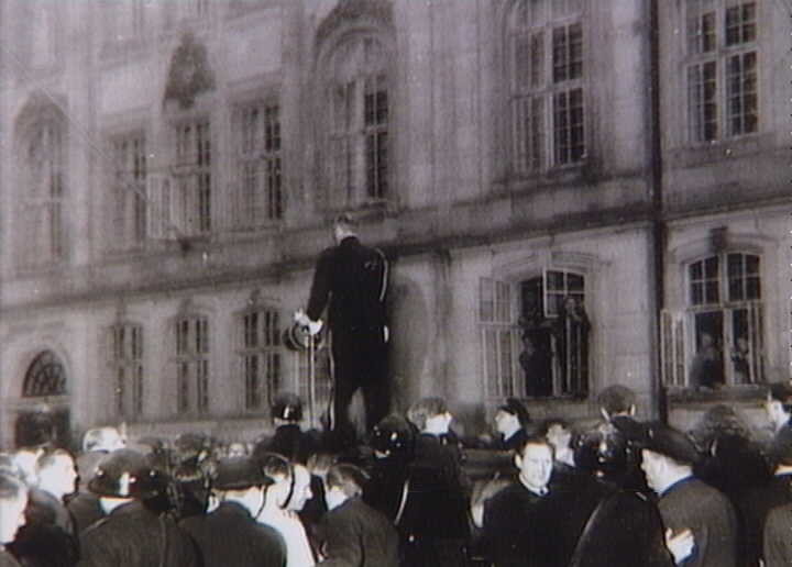 The king's aide-de-camp (Captain Henningsen) tells people that the king has gone to bed, so they can not see him. 4th May 1945.