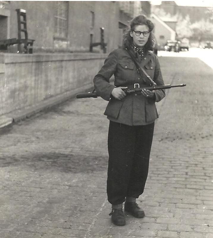 Woman. Freedom fighter with rifle at the Carlsberg Breweries. May 1945