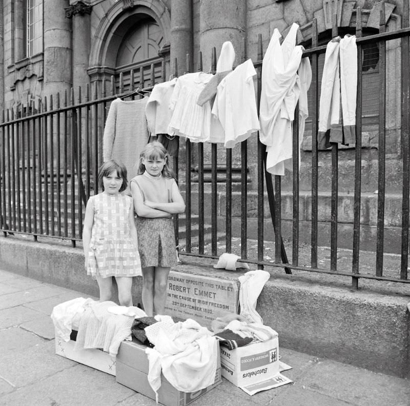 These two young entrepreneurs had set out their "stall" in front of St. Catherine's Church on Thomas Street in Dublin,1969