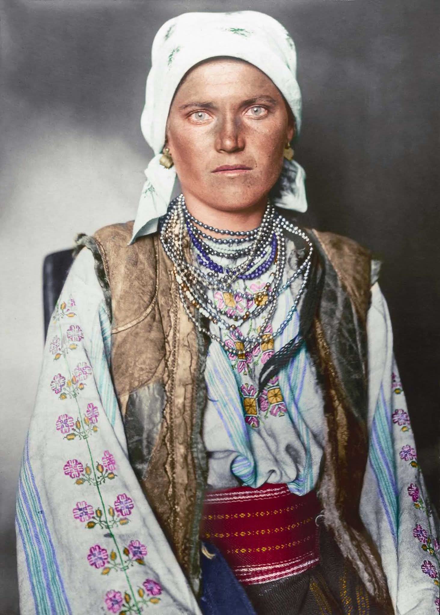 Ruthenian woman.” Historically inhabiting the kingdom of the Rus ranging from parts of modern-day Slavic-speaking countries, this example of Ruthenian traditional dress consisted of a shirt and underskirt made from linen which was embroidered with traditional floral-based patterns. The sleeveless ja