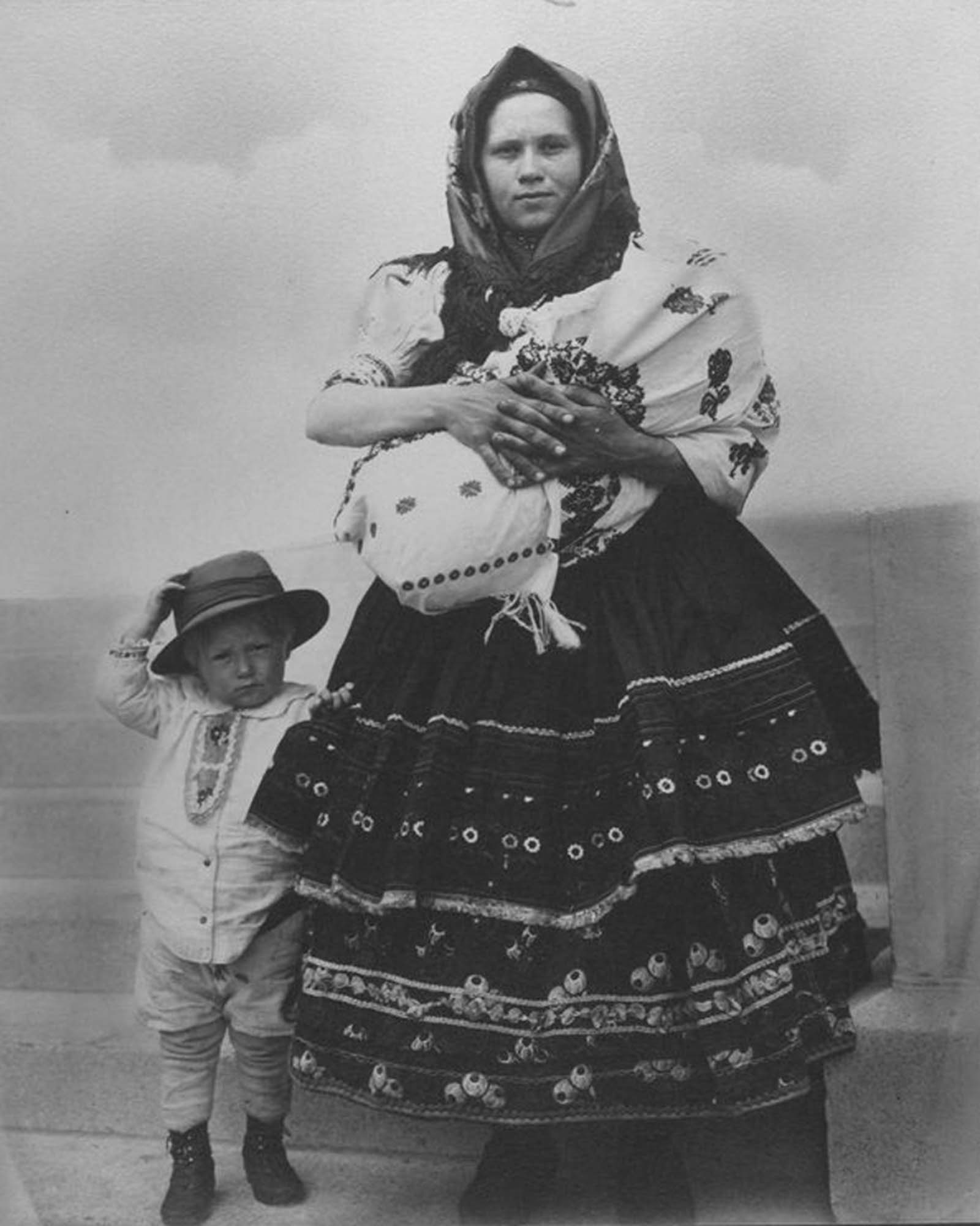 Slovak woman and children.” 1910.