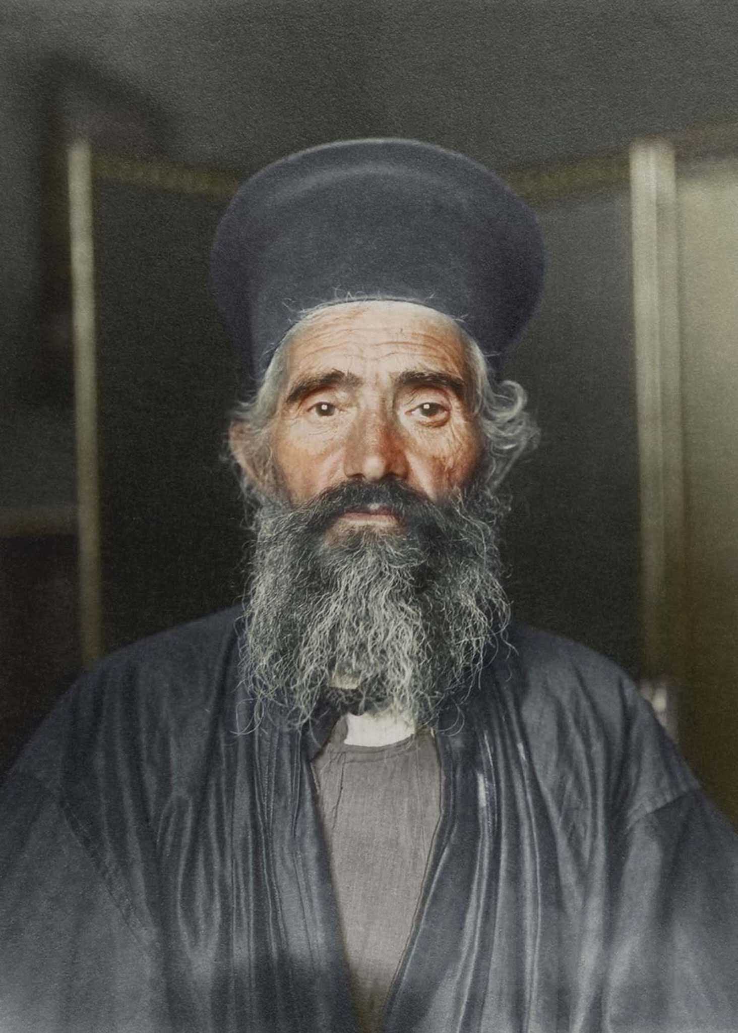 Rev. Joseph Vasilon, Greek-Orthodox priest.” The vestments of the Greek Orthodox church have remained largely unchanged. In this photograph, the priest wears an anteri, an ankle-length cassock (from the Turkish quzzak, from which the term ‘Cossack’ also derives) worn by all clergymen over which an a