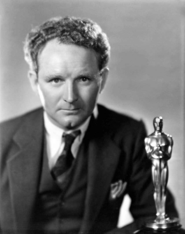 Best Director Dramatic Picture Frank Borzage poses with his award for “7th Heaven” in 1929