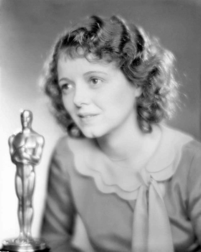 Janet Gaynor with her award for her performances in "7th Heaven," "Street Angel," and "Sunrise" in 1929