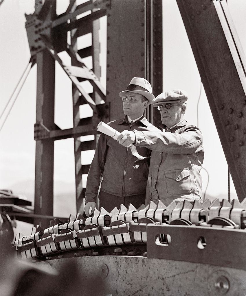 Engineers surveying Golden Gate Bridge construction, 1936.
